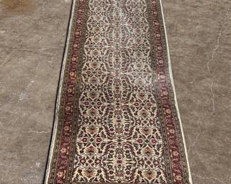 This lot features a Turkish runner rug that measures, 120” H x 32” W.
