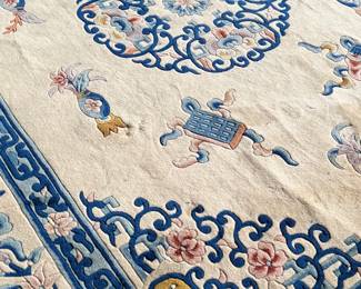 This lot features a hand made 100% wool rug from the People’s Republic of China in a cream color. Measures, 138” H x 99” W.