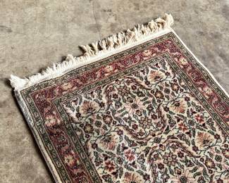 This lot features a Turkish runner rug that measures, 120” H x 32” W.