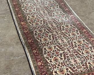 This lot features a Turkish runner rug that measures, 120” H x 32” W.