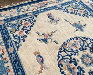 This lot features a hand made 100% wool rug from the People’s Republic of China in a cream color. Measures, 138” H x 99” W.