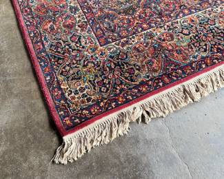 This lot features a Karastan multi-color panel Kirman area rug that measures, 14′ x 10′. 