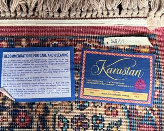 This lot features a Karastan multi-color panel Kirman area rug that measures, 14′ x 10′. 