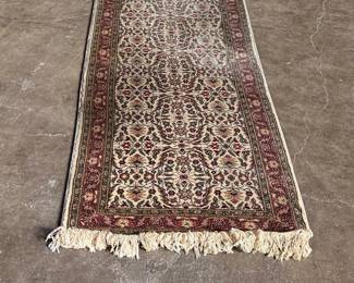 This lot features a Turkish runner rug that measures, 120” H x 32” W.