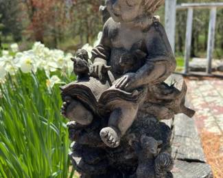 329 cherubangelgardenstatuereadingbook