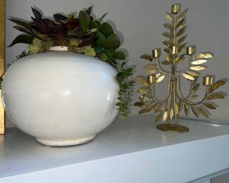 White ceramic vase and gold candelabra