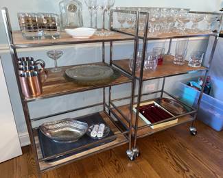 Rolling bar carts with bar accessories