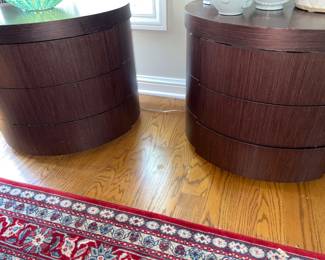 Dark wood barrel-shaped end tables