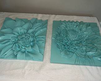 Two turquoise floral wall plaques