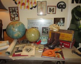 Pop culture explosion, vintage globes, butterfly taxidermy, cool blue rotary phone, old soda crates...
