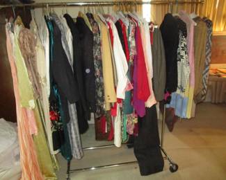 Nice rack of vintage clothing, rayon dresses, vintage nighties, most with labels