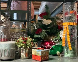 Christmas Decor Including LED Candle Display, Floral Arrangements, and Snowman Vase