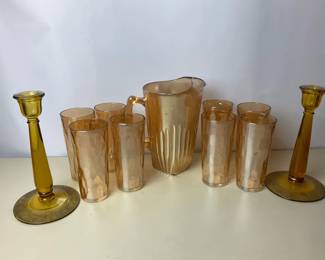 Vintage Jeanette Glass Company marigold carnival glass pitcher and tumblers featuring the Hex Optic