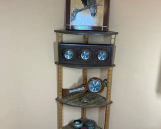 Corner Shelf Unit with Falcon Artwork and Decorative Items