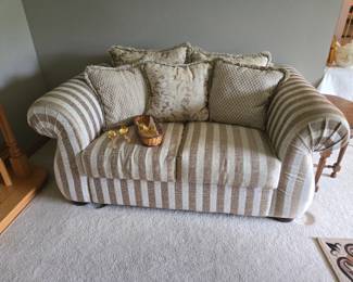 Loveseat...we have the matching sofas, gold colored flatware