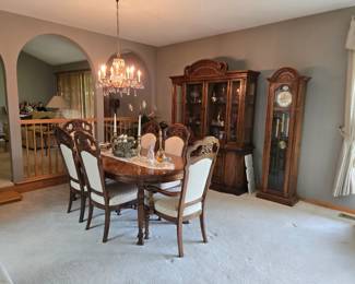 Dining table, china cabinet and grandfather's clock