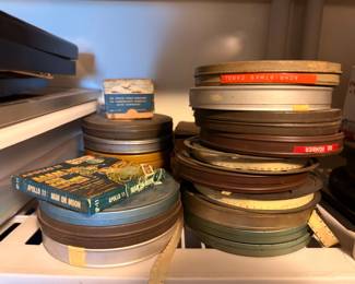 Vintage film reels, including Apollo 11 Man on Moon