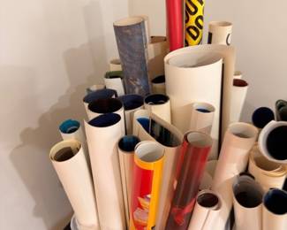 Bin of rolled posters, prints & maps