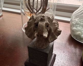 Carved elephant head sculpture lamp base