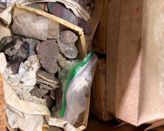 Box of wrapped mineral and rock specimens