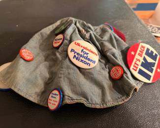 Vintage political campaign buttons, Nixon and Ike, on denim cap
