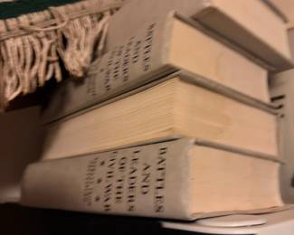 Stack of vintage hardcover books