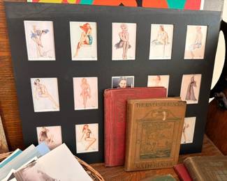 Matted vintage pin-up girl cards/prints with antique school readers