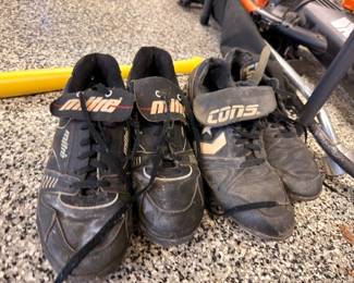 Vintage athletic cleats and Converse sneakers