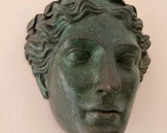 Wall-mounted classical face mask sculpture, verdigris finish
