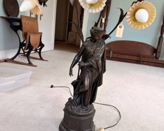 Figural bronze/spelter female statue lamp with lily-form shades
