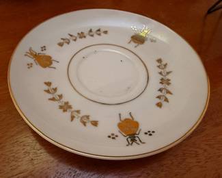 Porcelain plate with gilded insect / bug decoration