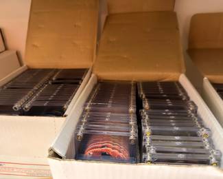 Boxes of sports cards in protective holders