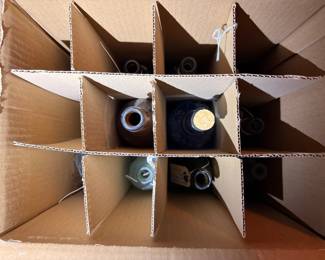 Divided box of bottles and decanters