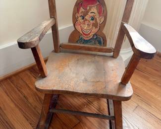 Vintage child's wooden rocking chair with Howdy Doody decal
