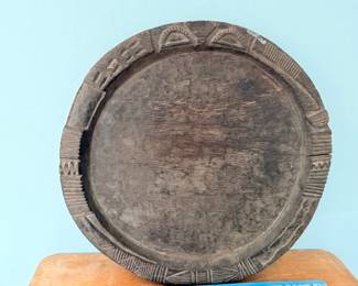 Hand-carved wooden tribal bowl / platter with geometric border
