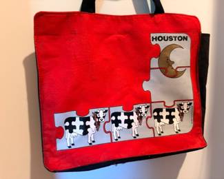 Red canvas tote bag with Houston cow graphic