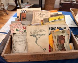 Wooden crate of vintage booklets, programs, and paper ephemera