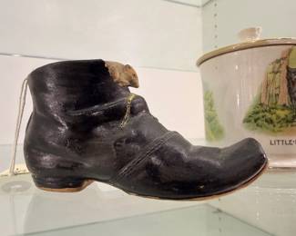 Figural boot vase with mouse and Little Red Riding Hood mug