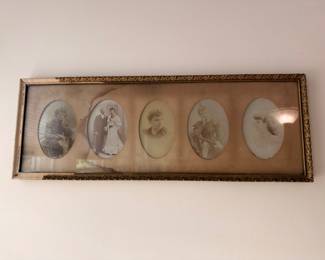 Antique gilt frame with Victorian oval portrait photographs