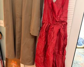 Women's red dress and tan coat