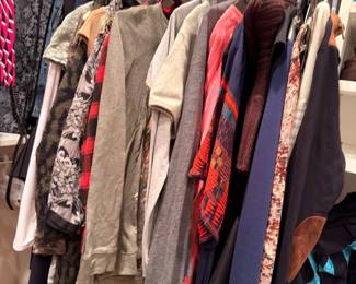 Closet of women's tops and dresses