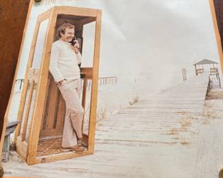Vintage singer-songwriter album promotional poster