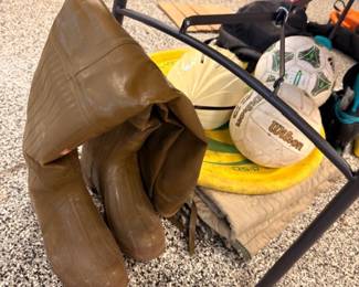 Rubber rain boots, Wilson footballs and hard hat