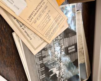 Vintage black and white photographs and documents