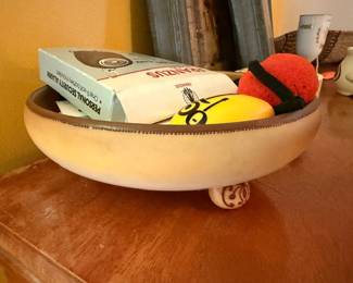 Ceramic bowl with Peanuts/Snoopy collectibles, tomato pincushion, and sewing items