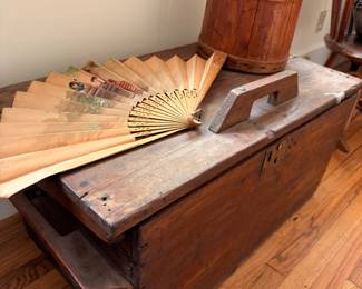 Antique wooden blanket chest with folding fan and wooden firkin