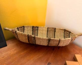 Handwoven coiled tribal basket