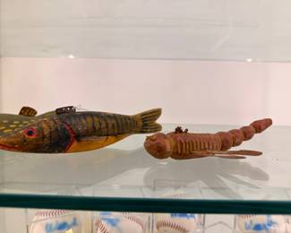 Vintage carved wooden fish spearing decoys with metal fins
