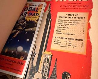 Vintage Rand McNally world atlas with WWII war-interest maps