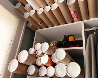 Storage tubes with rolled prints and maps